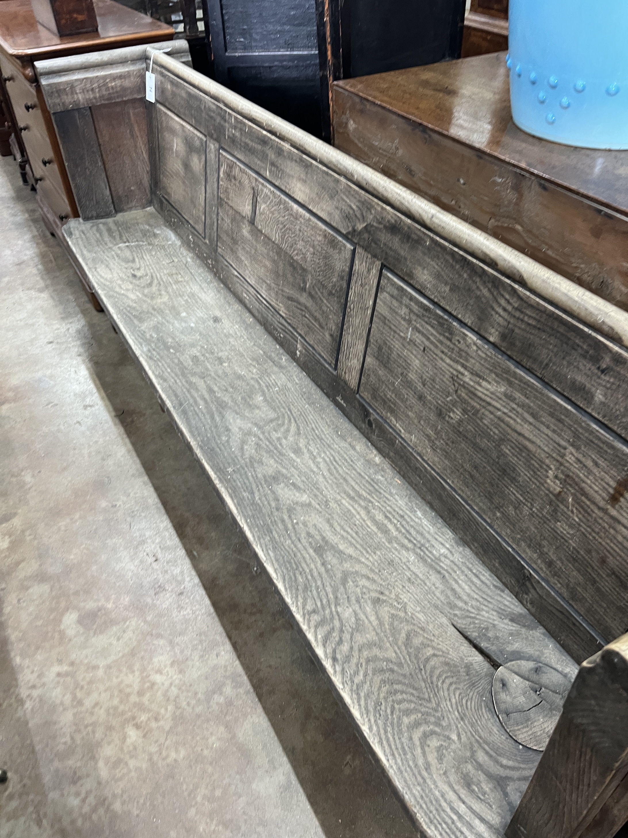 A Victorian oak pew, width 215cm, depth 45cm, height 86cm